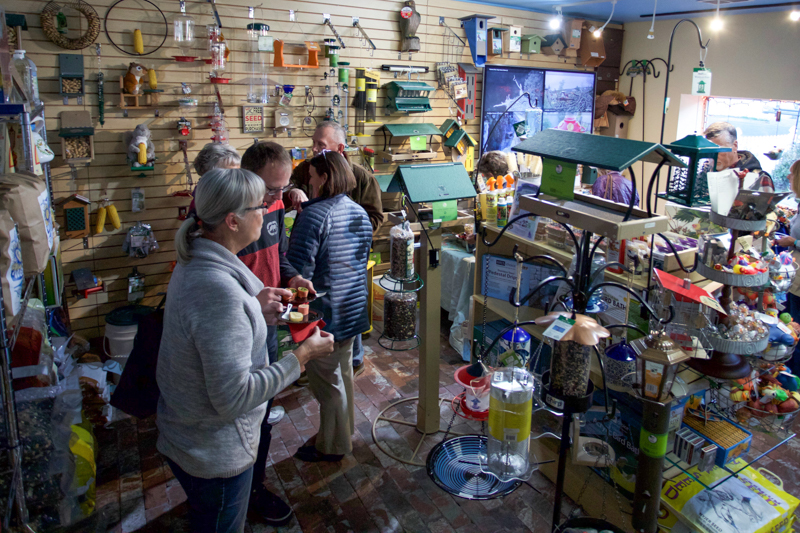 chirp nature center, internal view of shop, bird feeders hanging