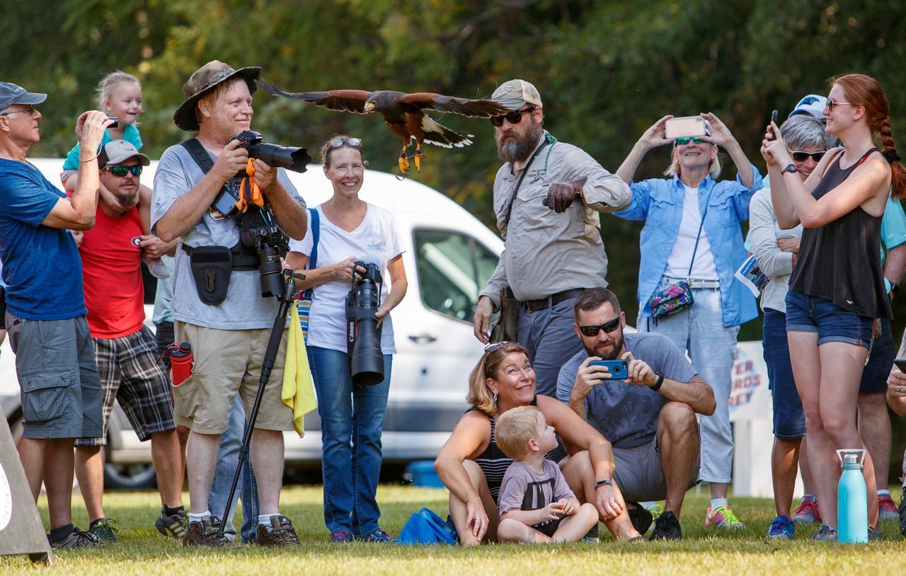 Group of birders with binoculars.