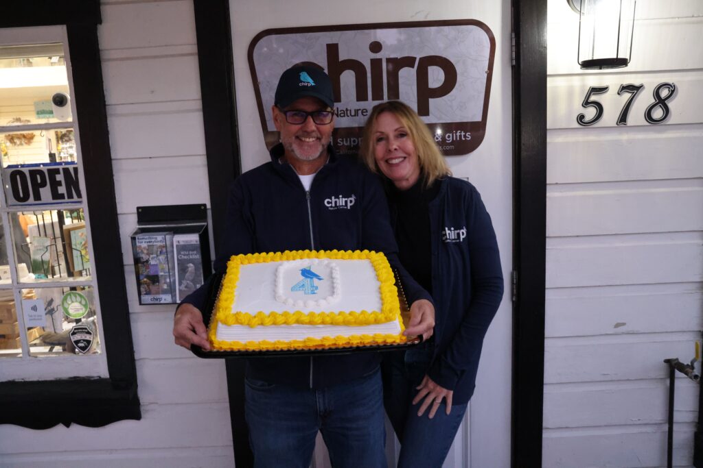 Chirp owners Randy Putz and Beth Wheat pose with celebratory cake for Chirp's 4-Year Hatchiversary in November 2022.
