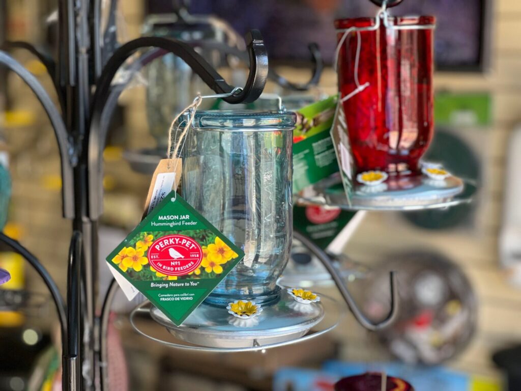 Shop curated wild bird supplies, like these hummingbird feeders, at the Chirp store in Big Bear Lake. 