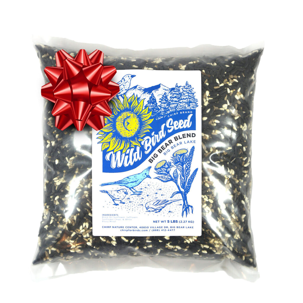 A bag of Chirp's Big Bear Blend bird seed with a red bow on the corner. 